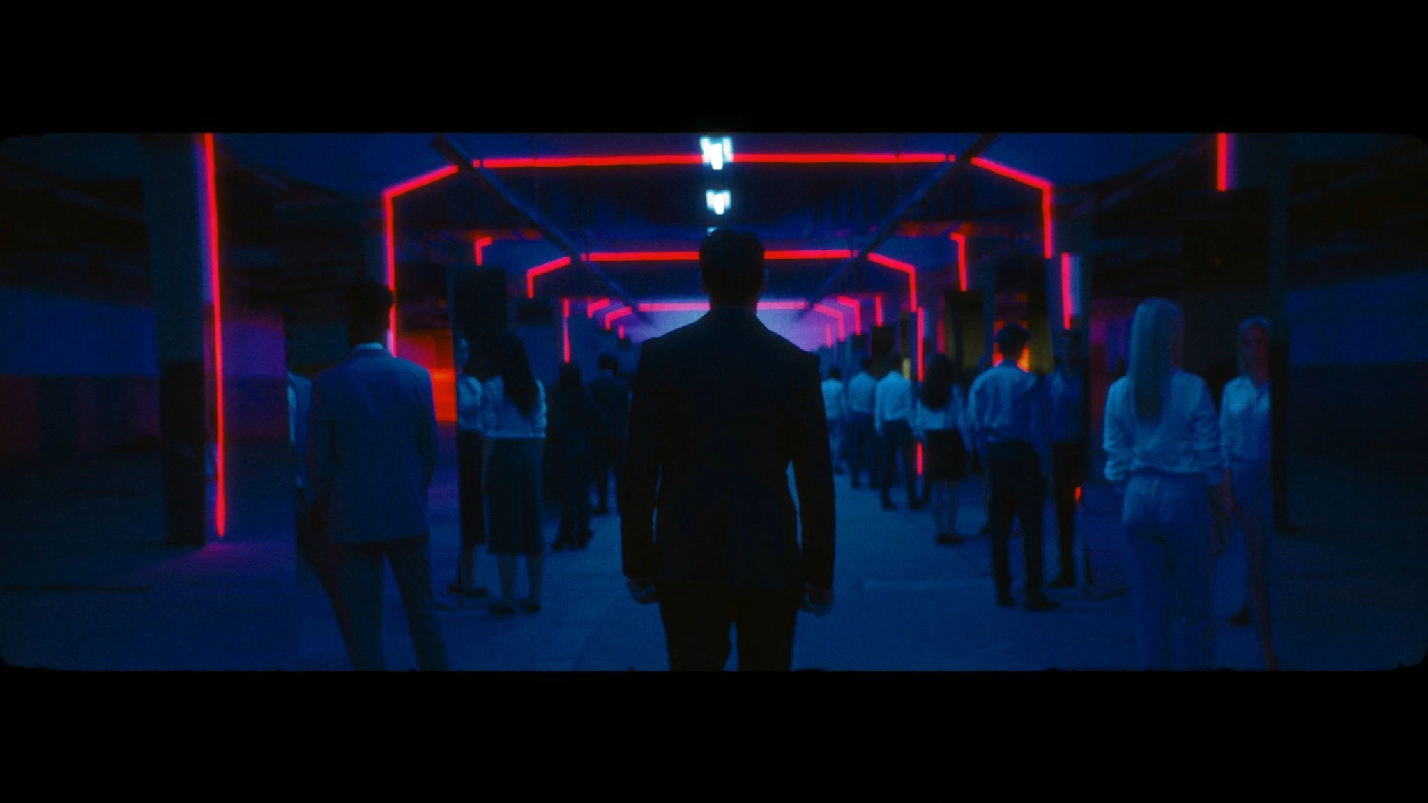 Neon corridor — real film frame